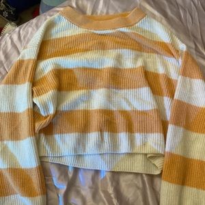 large (girls) orange and white cropped long sleeved sweater